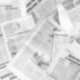 Abstract blurred image of old newspapers. Media news concept.
